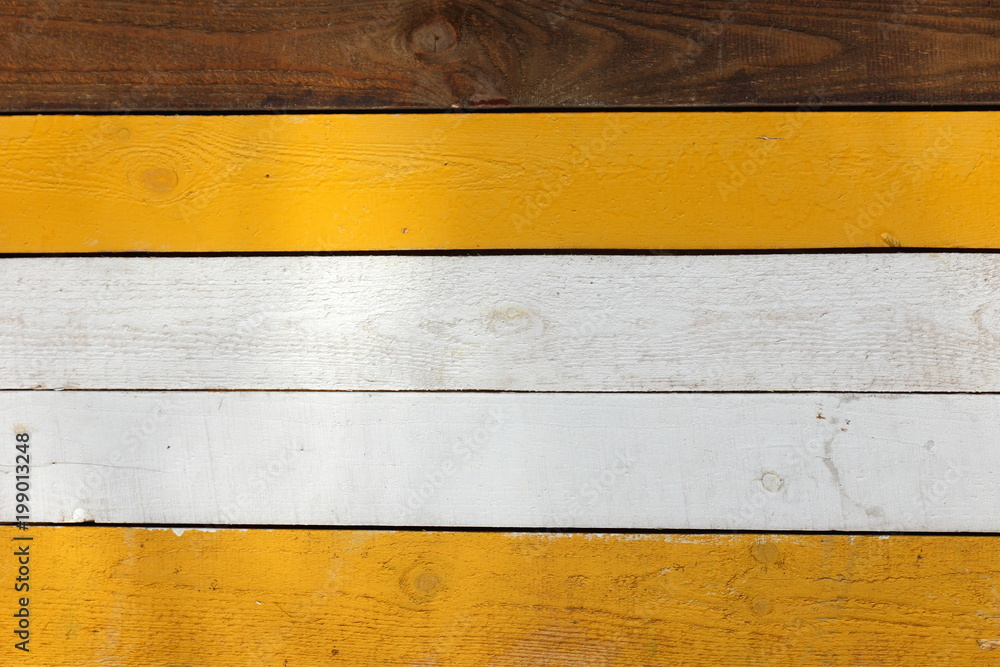 Wall mural Background of wooden boards, white and yellow painted boards, wooden texture of different colors, minimalism, smooth lines, blank for the designer