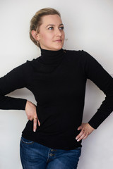 A  girl in a black turtleneck