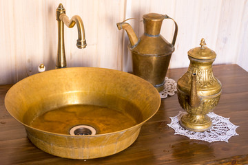 Close - up - copper washbasin with tap