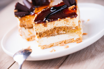 Pieces of cake on a dish and spoon
