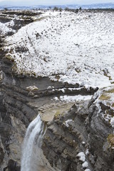 Beautiful Waterfalls On The Jump Of The River Nervion Snowy. Nature Landscapes Snow. March 23, 2018. Burgos Castilla-Leon Spain.