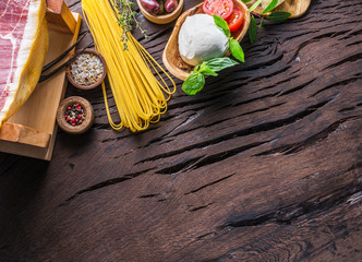 Variety of food on the wooden table. Top view.