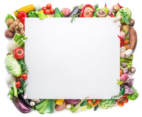 Different colorful vegetables arranged as a frame on white background.