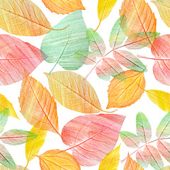 A seamless background pattern with green and golden yellow leaves