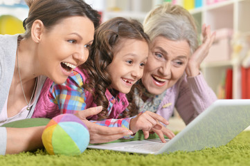 happy family using laptop