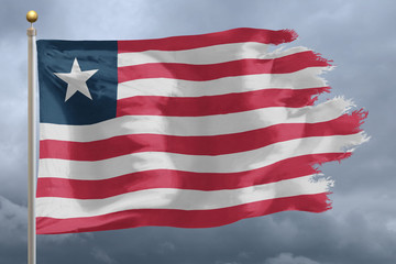 Obraz premium Liberia Flag with torn edges in front of a stormy sky
