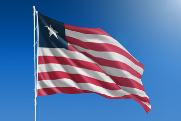 Liberia flag in front of a clear blue sky
