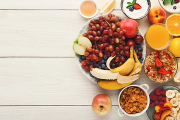 Fresh healthy breakfast with fruits copy space
