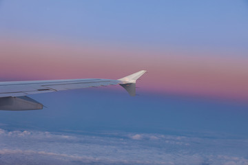 wing of aircraft in the sky