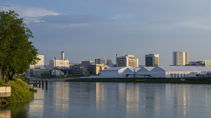 Naklejka premium industrial buildings along the Rhine River.