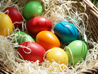 homemade colored easter eggs in easter basket