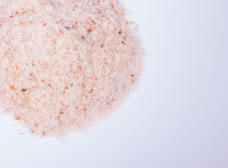 Pink Himalayan salt isolated on white background.