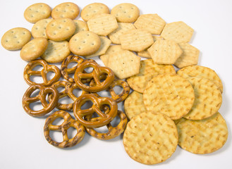 Mix of snacks : pretzels, crackers, cookies.