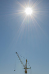construction crane on blue sky