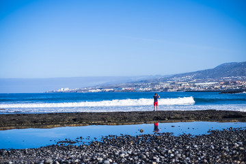 man look at the waves in vacation
