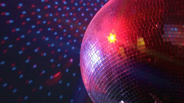 Rotating sparkling disco ball. Concept of night party.