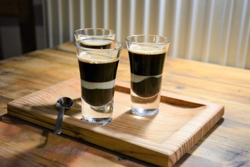 Coffee bonbon on a wooden tray