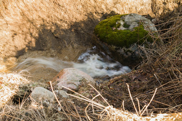 stone in a stream