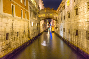 Fototapeta na wymiar Bridge of Sighs Night Colorful Side Canal Venice Italy