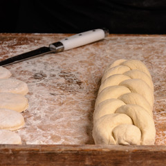 The female cook will sprinkle with poppy dough woven in a pigtail
