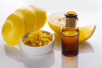 Lemon essential oil on a white background
