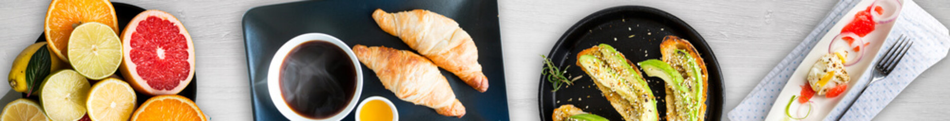 Different breakfasts. Fruits, croissants, coffee, eggs, sandwiches, granola, citrus fruits, lime, grapefruit, plates, avocado, honey. Top view. Wide panoramic image.