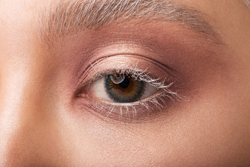 Obraz premium Human eye close-up with contact lenses. Nanotechnology of the future