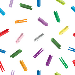 Seamless pattern with multi-colored clothes pegs