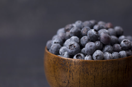 Fresh Blueberries in a Wooden Bowl