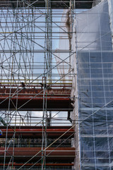 building construction site with scaffolding