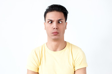 Portrait of crazy and funny idiotic man with stupid eyes
