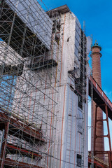 building construction site with scaffold