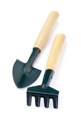 Garden tools isolated on white background, shovel and rake