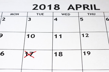 Calendar showing tax day for filing is April 17 2018. concept of tax payment.