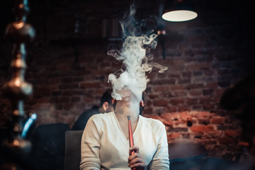 Fototapeta na wymiar Smoke woman