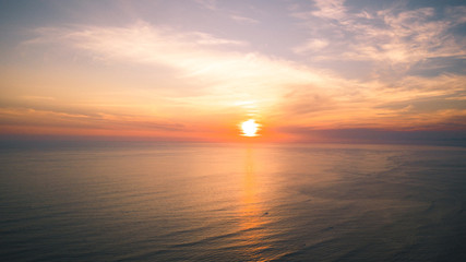 Naklejka premium beach at sunset aerial
