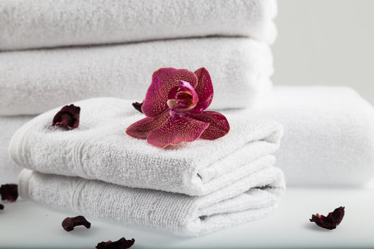 Towel concept. Spa concept. Photo for hotels and massage parlors. Purity and softness. Towel textile. 