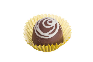 Homemade chocolate truffle.  Overhead of candy ball in white background.