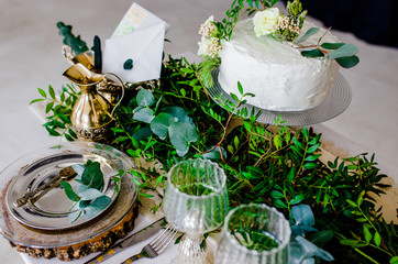White and natural wedding cake on a black background