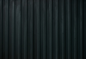 Dark metal mesh. Black steel metallic hole texture background. Dotted metallic iron abstract background