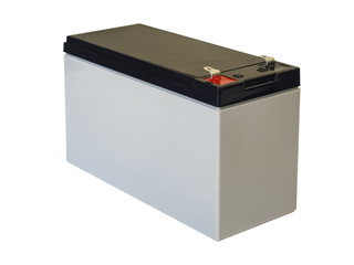 Close-up of DC constant voltage accumulator or battery with terminals for wires connecting. Black, red and grey colors. Isolated on white background. High-quality macro photography.