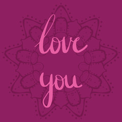Love you lettering with a mandala like background