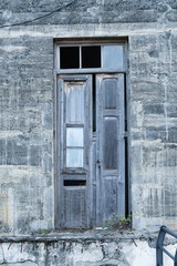 morbid old grey door