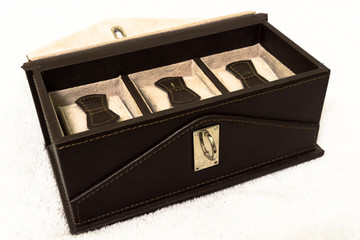 Luxury watch gift box. Personal, present. Empty and sewn watch box in leather fabric with lock