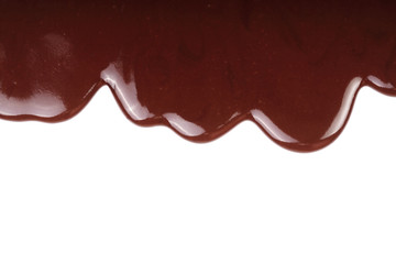 Melted chocolate dripping isolated on white background