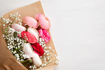 Bouquet of pink and white ranunculus flowers. Celebration concept