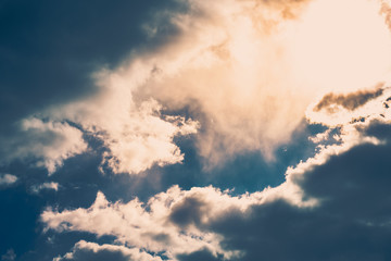 Natural background - rain clouds illuminated by the sun, dramatic scene