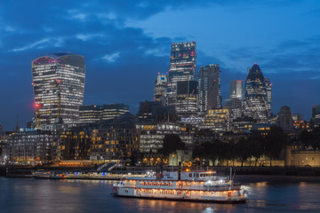 Fototapeta na wymiar Thames embankment and london skyscrapers in City of London in the night