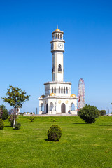 Obraz premium Batumi lighthouse on the Batumi Seafront Promenade in the sunny day, Adjara, Georgia