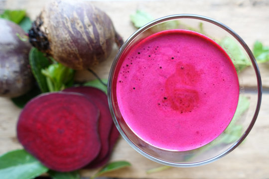 Top view of a tasty beverage from raw  beet vegetable, drink for a healthy diet concept
